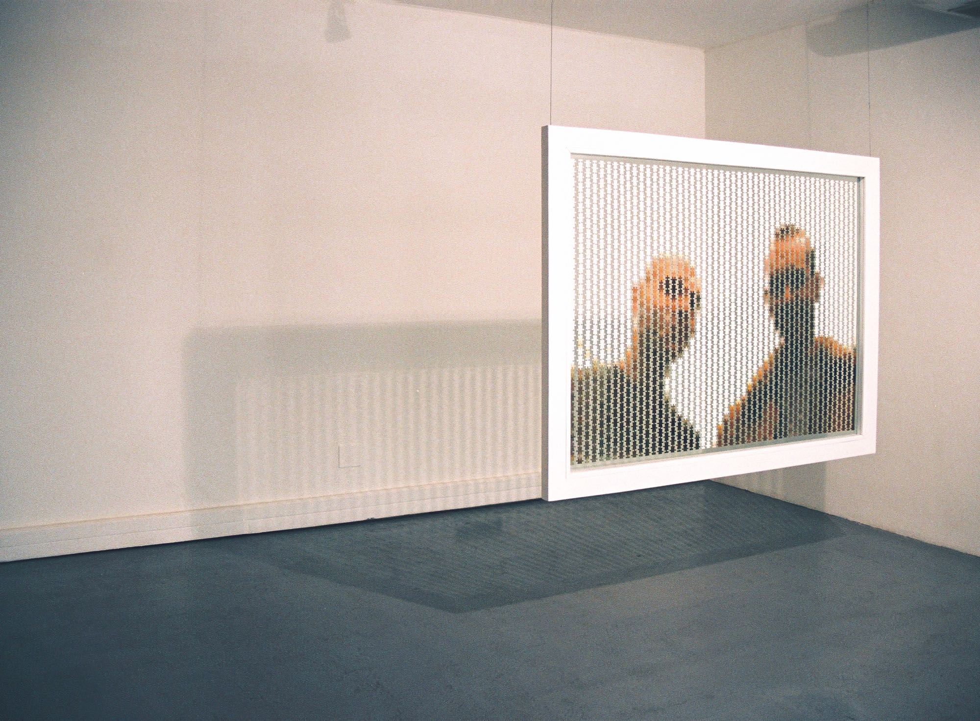  Pierre Fouché. The distance between us (2003). Acrylic on found cardboard puzzle, glass, pine, steel, cable wire. 135 x 185 x 6cm. Corporate Collection.
